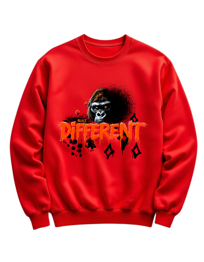 Red crewneck sweatshirt with custom DTF printed fierce gorilla design featuring orange glowing eyes and dripping text effect with diamond accents