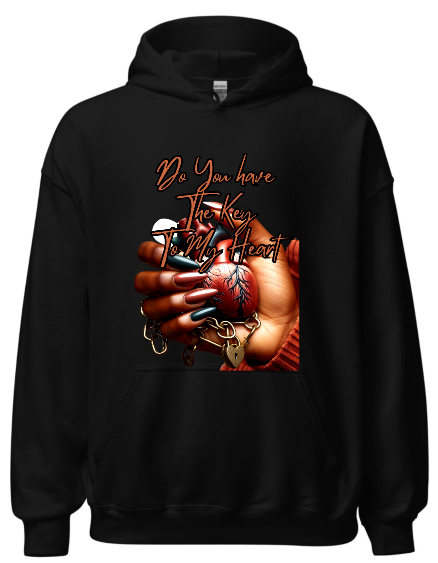 Black hoodie with custom DTF printed design featuring anatomical heart in hand with lock and chain details and copper script text