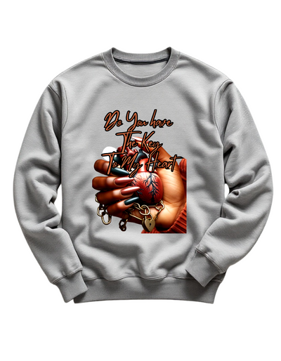 Grey crewneck sweatshirt with custom DTF printed design featuring anatomical heart in hand with lock and chain details and copper script text