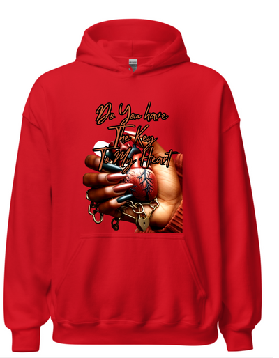 Red hoodie with custom DTF printed design featuring anatomical heart in hand with lock and chain details and copper script text