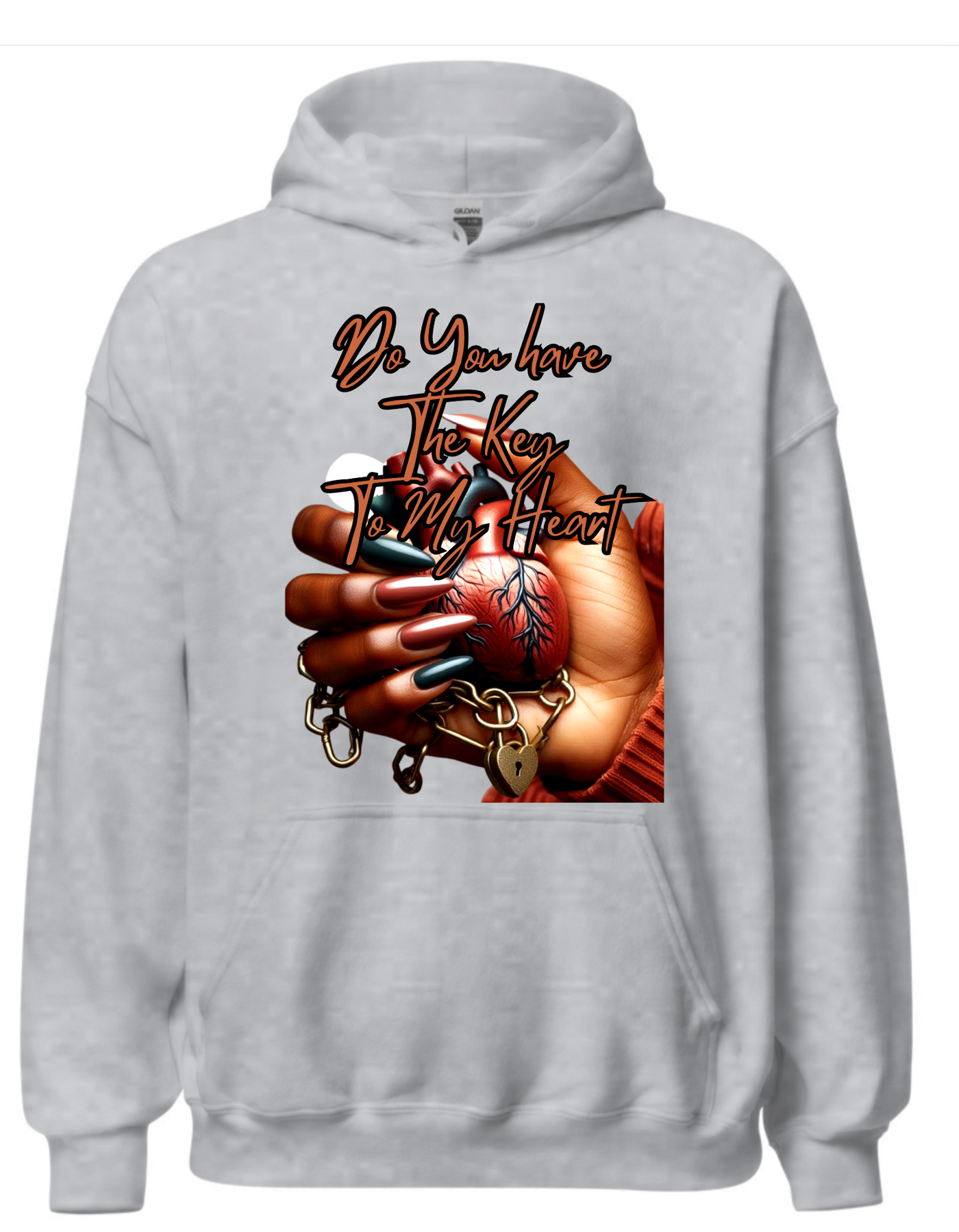 Grey hoodie with custom DTF printed design featuring anatomical heart in hand with lock and chain details and copper script text